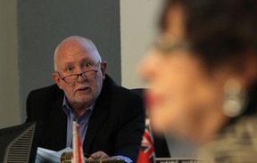 Mike Phipps, chief administrative officer for the Town of Amherstburg, gives councillor Diane Pouget an expressive look during discussions in this August 2014 file photo. (DAX MELMER/The Windsor Star)