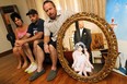 WINDSOR, ON.: AUGUST 26, 2014 --  Shelley Voakes, Peter Campbell and Randy Voakes (left to right) sit next to a wedding photo of Priscilla and Peter Campbell in Essex on Tuesday, August 26, 2014. Artist and activist Priscilla Campbell passed away suddenly on Sunday.                (Tyler Brownbridge/The Windsor Star)