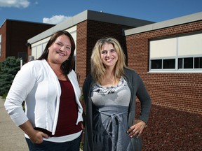 Marianne Jeney, left, a local film producer, and Sarah Ilijanich, owner of the Lakeshore Academy of Fine Arts, are pictured in front of the Puce Sports and Leisure Centre, Wednesday, August 13, 2014.  The pair are hoping to use the building for a new performing arts centre.  (DAX MELMER/The Windsor Star)