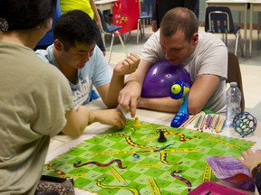 August 7 — Staff, student and teachers swung by and participated in the Bruce Awad Summer Program for Individuals with Autism. Photo by Jay Rankin (#2 of this shot)