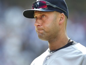 Yankees all-star shortstop Derek Jeter leaves the field at the end of their loss to the Toronto Blue Jays on Saturday, August 30, 2014. (THE CANADIAN PRESS/Fred Thornhill)