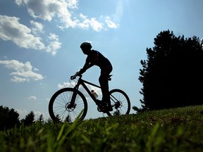 Gavin Kerr competes in the time trials mountain bike races on day one of the Ontario Summer Games at Malden Park in Windsor on Thursday, August 7, 2014. (Tyler Brownbridge/The Windsor Star)