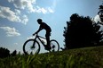 Gavin Kerr competes in the time trials mountain bike races on day one of the Ontario Summer Games at Malden Park in Windsor on Thursday, August 7, 2014. (Tyler Brownbridge/The Windsor Star)