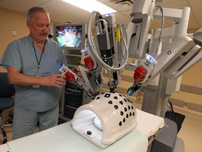 Dr. Ronald Sorensen demonstrates the da Vinci Surgical System at Windsor Regional Hospital in Windsor on Wednesday, August 6, 2014.              (Tyler Brownbridge/The Windsor Star)