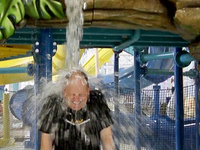 City Coun. and mayoral candidate Drew Dilkens took the ALS Ice Bucket Challenge, then  challenged councillors Ron Jones, Alan Halberstadt and Fulvio Valentinis to do the same. (RICK DAWES/The Windsor Star)