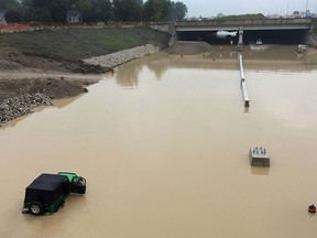 A section of the Herb Gray Parkway in Windsor, ON. is shown on Tuesday, July 12, 2014 under a large amount of water due to Monday's massive downpour. (DAN JANISSE/The Windsor Star)