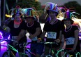Team Taylor members wait for the glow ride to begin Saturday, August 9, 2014, at the Riverside Sportsmen's Club. The Light Up the Night glow ride raised money for the Seeds for Hope program. (RICK DAWES/The Windsor Star)