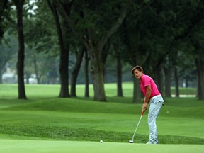Curtis Hughes putts during the 2014 Essex-Kent Golf Tournament at Roseland Golf Course in Windsor on Wednesday, August 20, 2014.               (Tyler Brownbridge/The Windsor Star)