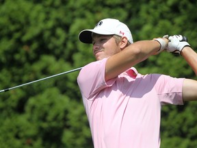 Kyle Wicks, 21, tees off on the third hole at Beach Grove Golf & Country Club during the second round of the Western Ontario Amateur Championship, Sunday, August 3, 2014.  (DAX MELMER/The Windsor Star)