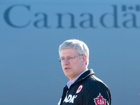 Canadian Prime Minister Stephen Harper arrives in Cambridge Bay, Nunavut on Saturday, August 23, 2014. THE CANADIAN PRESS/Adrian Wyld
