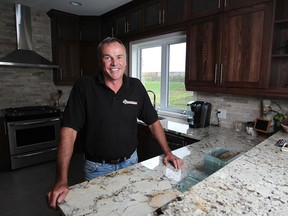 Ben Klundert, president of the Home Builders Association, is pictured inside a model home located in Forest Hill Estates in Belle River, Monday, August 11, 2014.  (DAX MELMER/The Windsor Star)