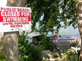 Signs stating beach are closed for swimming are posted throughout Pelee Island. (JOEL BOYCE/The Windsor Star)