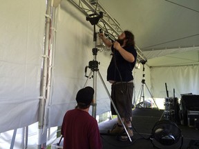 Volunteers prepare the venue for the Kinsville Folk Music Festival. (Ted Shaw/The Windsor Star)