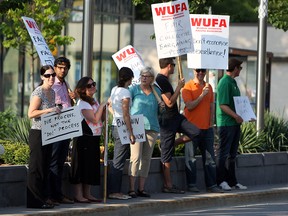 Members and supporters of the Windsor University Faculty Association demonstrate on the U of W campus, Aug. 21, 2014. (Tyler Brownbridge / The Windsor Star)