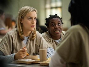 - This image released by Netflix shows Taylor Schilling, left, and Uzo Aduba in a scene from "Orange Is the New Black." (AP Photo/Netflix, Paul Schiraldi, File)