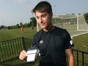 Joey Filipic, a local soccer referee, is pictured at McHugh Park during the Ontario Summer Games, Sunday, August 10, 2014. Filipic will be reffing the men's final soccer game. (DAX MELMER/The Windsor Star)