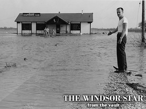 It appears that Mike Bunt, Star staff photographer forgot his waterwings when assigned to the annual birdhouse building competition at Riverside Sportsmen's Club. The club was swamped when the East Marsh drain spilled over its banks flooding acres in the districton May 14, 1956. (FILES/The Windsor Star)