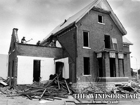 The first of Windsor's 15 buildings which have been designated as having historic significance is being torn down in this Aug. 16, 1984 file photo. The Reinhold Gluns residence, which was built around 1875 on Sandwich Street, is being demolished to make way for a parking lot. (TIM MCKENNA/The Windsor Star)