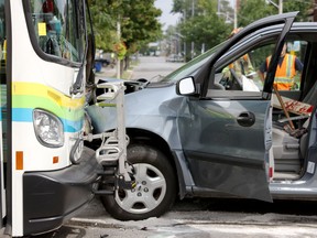 The scene of a three vehicle accident is pictured at the intersection of Sandwich Street and Mill Street Sunday Aug. 24, 2014. At least one woman was sent to hospital with non-life threatening injuries. (RICK DAWES/The Windsor Star)