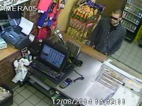 An image of the man who robbed three local Subway locations on Aug. 12, 2014. (Handout / The Windsor Star)