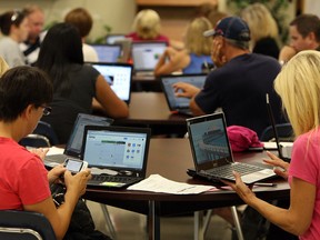 Teachers take part in a google training class at St. Joseph's High School in Windsor on Tuesday, August 19, 2014. Close to 150 educators took part in training on Google educational software and apps.               (Tyler Brownbridge/The Windsor Star)