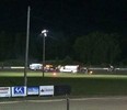 Ambulances on the scene at Canandaigua Motorsports Park on Saturday Aug. 9, 2014 in Canandaigua, N.Y. Authorities are investigating a serious crash that injured one person at a New York dirt track where Tony Stewart was racing on the eve of a NASCAR race. (Logan Messerly/The Associated Press)