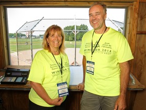 Joyce and Mark Ouellette, volunteers at the Ontario Summer Games, are pictured in the scorer's booth at Mic Mac Park, Friday, August 8, 2014.  (DAX MELMER/The Windsor Star)