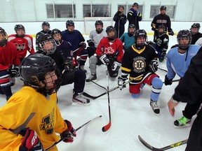 Grade 9-10 students listen to instructions during F.J. Brennan Centre of Excellence and Innovation's Hockey Canada Skills Academy at the renovated Central Park Athletics facility Monday September 08, 2014. See Waddell story. (NICK BRANCACCIO/The Windsor Star)