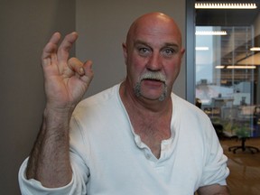Fisherman Eddie Parent talks about size of lures he uses to catch muskie during a visit to The Windsor Star Wednesday September 10, 2014. Parent wanted to set the record straight regarding an incident where he was caught on video with a muskie. (NICK BRANCACCIO/The Windsor Star)