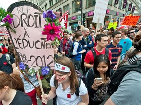 Tens of thousands of students protest in this March 22, 2012 file photo against a 75-percent tuition hike at universities in Canada's mostly French-speaking Quebec province, bringing downtown Montreal to a standstill.  (ROGERIO BARBOSA/AFP/Getty Images)