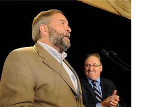 Canada's New Democratic Party (NDP) Leader Thomas Mulcair gets a standing ovation at the NDP Caucus Strategy Session held at the Fairmont Hotel Macdonald in Edmonton on September 10, 2014. (Larry Wong/Postmedia News)
