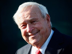 Arnold Palmer looks on during the trophy ceremony after the final round of the Arnold Palmer Invitational presented by MasterCard at the Bay Hill Club and Lodge on March 23, 2014 in Orlando, Florida.  (Photo by Sam Greenwood/Getty Images) ORG XMIT: 458841495