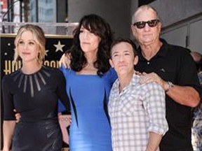 Christina Applegate, from left, Katey Sagal, David Faustino, and Ed O'Neill from "Married with Children" attend the ceremony honoring Katey Sagal with a star on The Hollywood Walk Of Fame on Tuesday, Sept. 9, 2014, in Los Angeles. THE CANADIAN PRESS/Richard Shotwell/Invision/AP