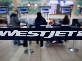 WestJet Airlines Ltd. will charge some economy passengers for their first checked bag, a change it expects will affect about one-fifth of its customers.