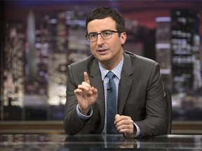 In this April 2014 image released by HBO, host John Oliver speaks during "Last Week Tonight with John Oliver," in New York. In this April 2014 image released by HBO, host John Oliver speaks during "Last Week Tonight with John Oliver," in New York.