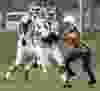 Herman running back Jalen Jackson, centre, scores a touchdown against St. Anne Thursday. (JASON KRYK/The Windsor Star)