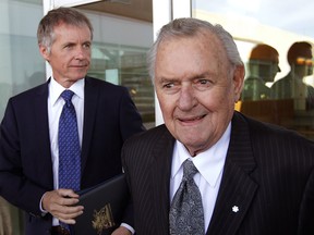 Ron Joyce, right, Chairman Joyce Foundation, donated $10 million in support of students at University of Windsor for the creation of Ed Lumley Bursary. In photo, Univesity of Windsor President Alan Wildeman, left, greets Joyce at the press conference announcing the generous gift. (NICK BRANCACCIO/The Windsor Star)