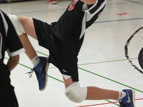 Maranatha Christian Academy's Michael Vriesema uses his leg to dig a ball against Westview Freedom Academy. (DAN JANISSE/The Windsor Star)