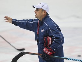 Windsor Spitfires head coach Bob Boughner instructs the team during practice at the WFCU Centre Tuesday. (JASON KRYK/ The Windsor Star)