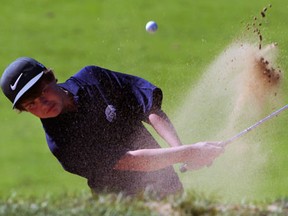 Massey's Mitchell Shields hits a shot from the sand trap Wednesday at the WECSSAA golf championships in Kingsville. (NICK BRANCACCIO/The Windsor Star)