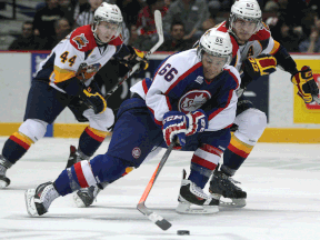 Windsor's Josh Ho-Sang, right, is checked by Erie's Troy Donnay at the WFCU Centre. (Windsor Star)