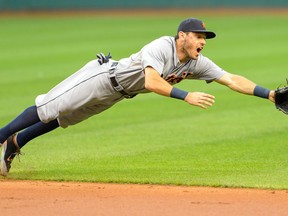 Tigers second baseman Ian Kinsler dives for a ground ball off the bat of Michael Brantley of the Cleveland Indians during the first inning at Progressive Field Tuesday in Cleveland. (Photo by Jason Miller/Getty Images)