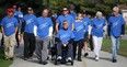 Friends and family walk with Bill Maden, centre, who was diagnosed with ALS in March of 2012, during the ALS WIndsor Walk on the Ganatchio Trail, Sunday, Sept. 14, 2014.   (DAX MELMER/The Windsor Star)