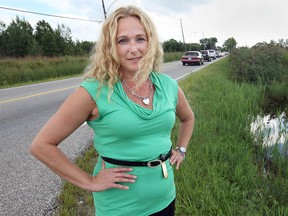 Nancy Pancheshan is shown along Matchettte Rd. in Windsor, ON. on Tuesday, Sept. 2, 2014. She is part of a group that is concerned about the environmental impact of a Big Box development in the area. (DAN JANISSE/The Windsor Star)