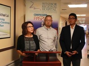 WINDSOR, ONT.:SEPTEMBER 19, 2014 -- Jacqueline Lai and her sons, Chris and Bryan, speak at the naming dedication of the Dr. Michael Lai Oncology Medication/Chemotherapy Room on Friday, September 19, 2014. (JAY RANKIN/The Windsor Star)