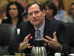 Dr. Gary Kirk, associate medical officer of health and CEO for the Windsor-Essex County Health Unit speaks to Windsor city council on Monday, Sept. 8, 2014, in Windsor, ON. asking for more funding. (DAN JANISSE/The Windsor Star)