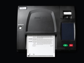 Promotional image of a vote tabulation machine from Dominion Voting Systems.