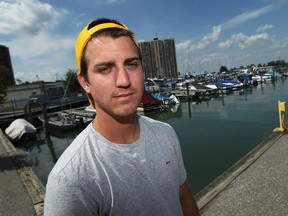 Dane Alexander is photographed at the Lakeview Marina in Windsor on Tuesday, September 9, 2014. Alexander was one of two fishermen on the Detroit River who witnessed and videotaped a man kill a fish before throwing it back in the river. The video has sparked outrage among those who have seen it.                    (TYLER BROWNBRIDGE/The Windsor Star)