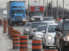 In this file photo, traffic is restricted along Huron Church Rd. near the Grand Marais drain where three lanes merge into two in the north bound lanes due to the parkway project. It has increased truck traffic on E.C. Row as truckers try to avoid the area. March 1, 2012.  (DAN JANISSE/The Windsor Star)