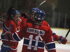 Belle River's Sebastian Kanally, left, Mike Ditty, front, and Branden Larocque celebrate a first period goal as the Belle River Canadiens host the Essex 73's in the Junior C final the Belle River Lakeshore Arena, Friday, March 7, 2014.  (DAX MELMER/The Windsor Star)